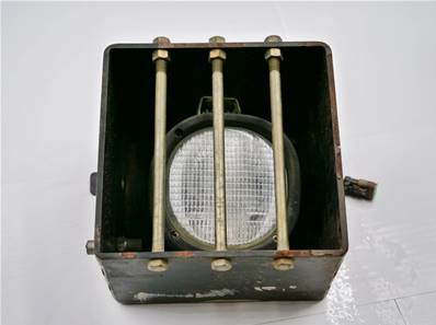 Used left headlight protection complete with screws John Deere AT187853-US